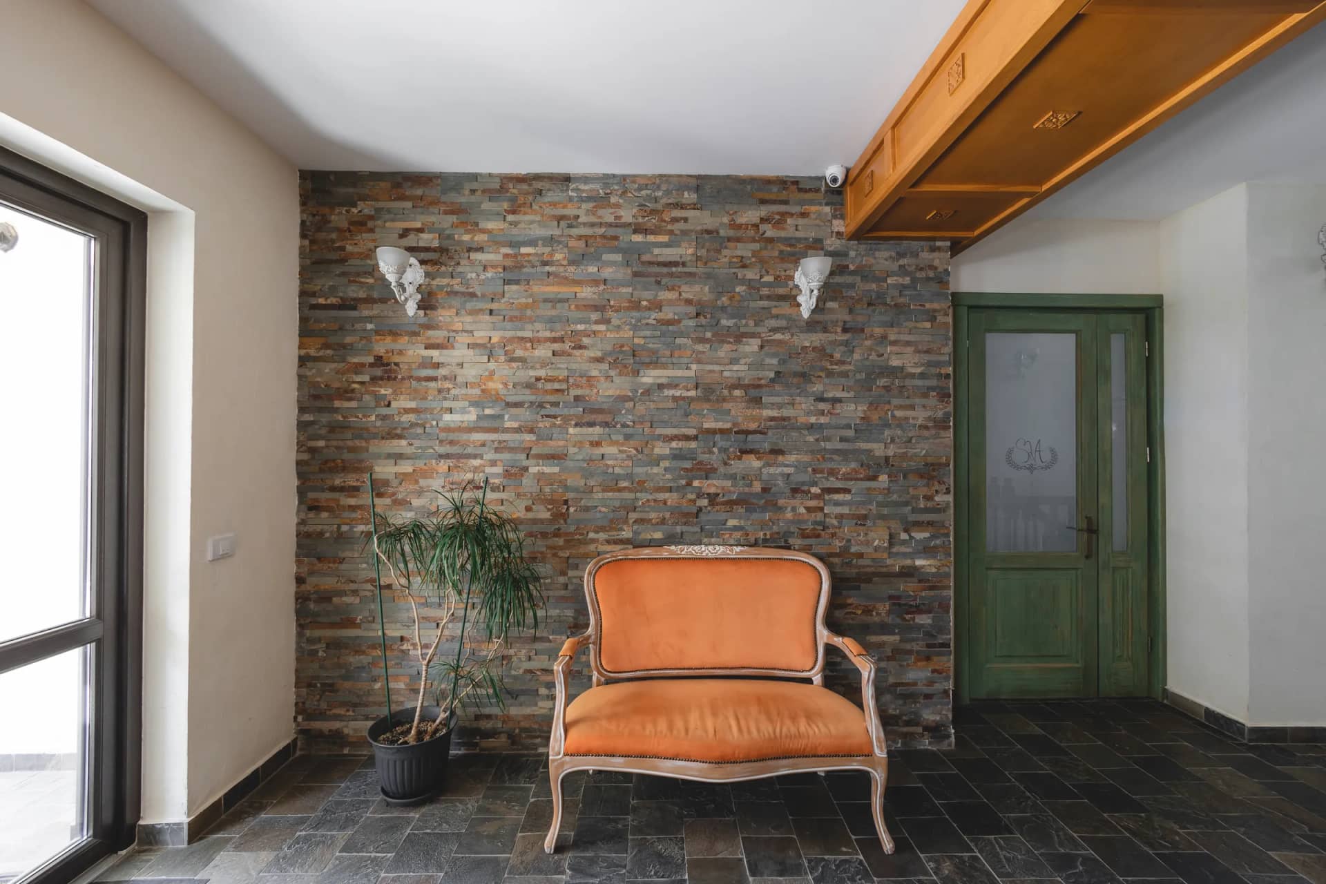 The layered stone wall at reception